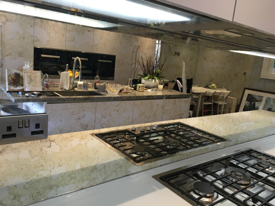Mirror glass splashback in West Drayton luxury kitchen